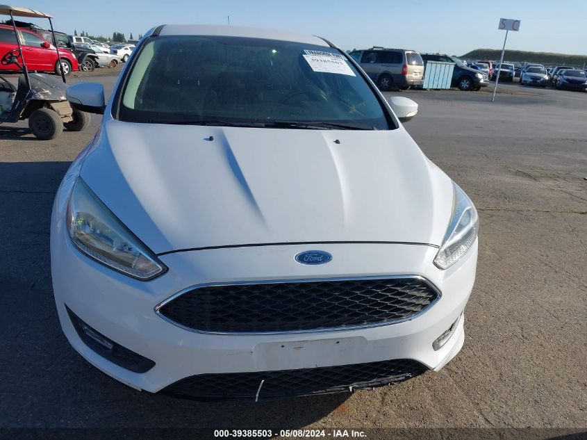 2016 Ford Focus Se VIN: 1FADP3F23GL392204 Lot: 39385503