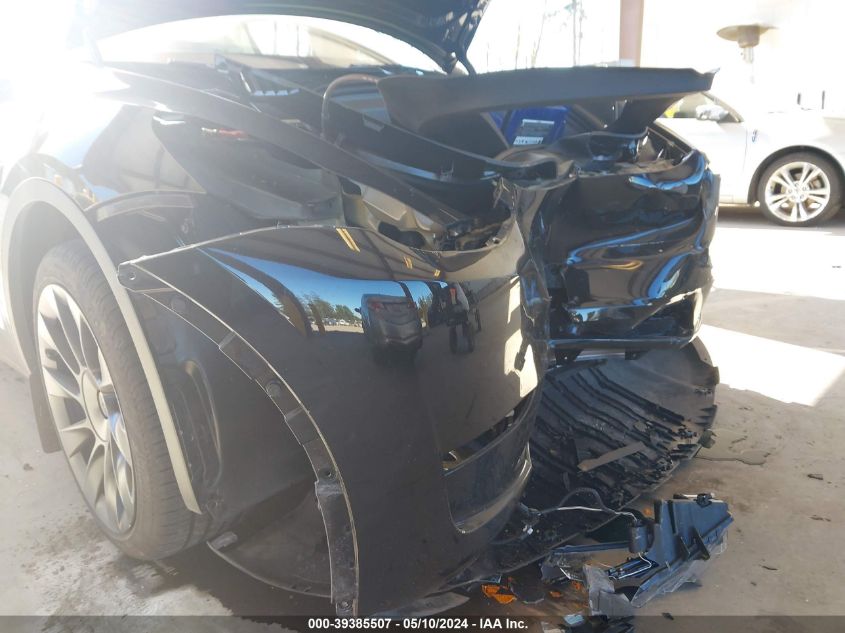 2024 Tesla Model Y Long Range Dual Motor All-Wheel Drive VIN: 7SAYGAEE9RF981360 Lot: 39385507
