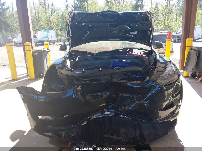 2024 Tesla Model Y Long Range Dual Motor All-Wheel Drive VIN: 7SAYGAEE9RF981360 Lot: 39385507