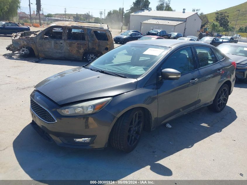 2016 Ford Focus Se VIN: 1FADP3F24GL307645 Lot: 39385924