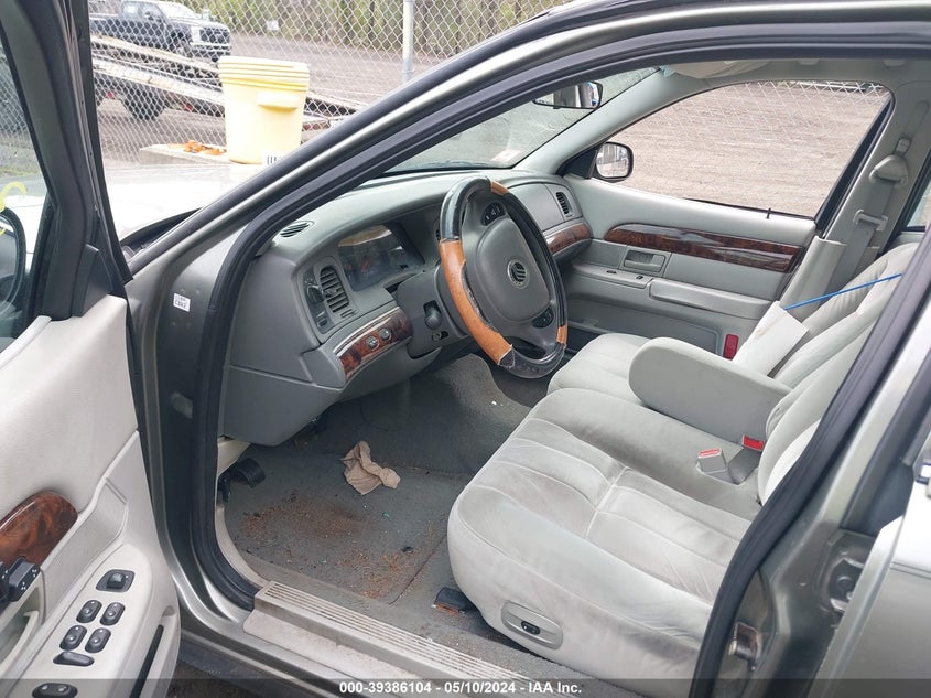 2004 Mercury Grand Marquis Gs VIN: 2MEFM74W24X678535 Lot: 39386104