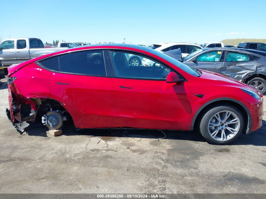 2023 Tesla Model Y Awd/Long Range Dual Motor All-Wheel Drive VIN: 7SAYGDEE9PF911338 Lot: 39386250