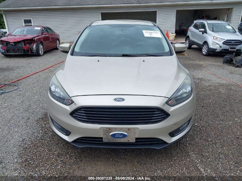 2017 Ford Focus Se VIN: 1FADP3FEXHL306916 Lot: 39387235