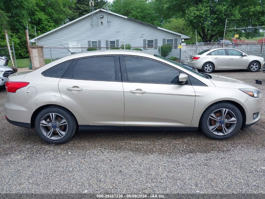 2017 Ford Focus Se VIN: 1FADP3FEXHL306916 Lot: 39387235