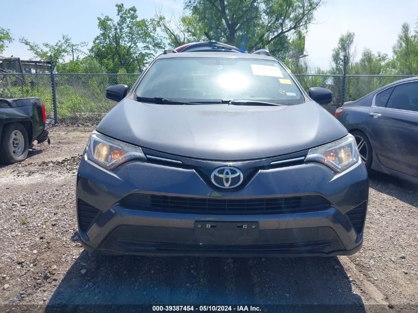 2016 Toyota Rav4 Le VIN: JTMZFREV4GD086706 Lot: 39387454