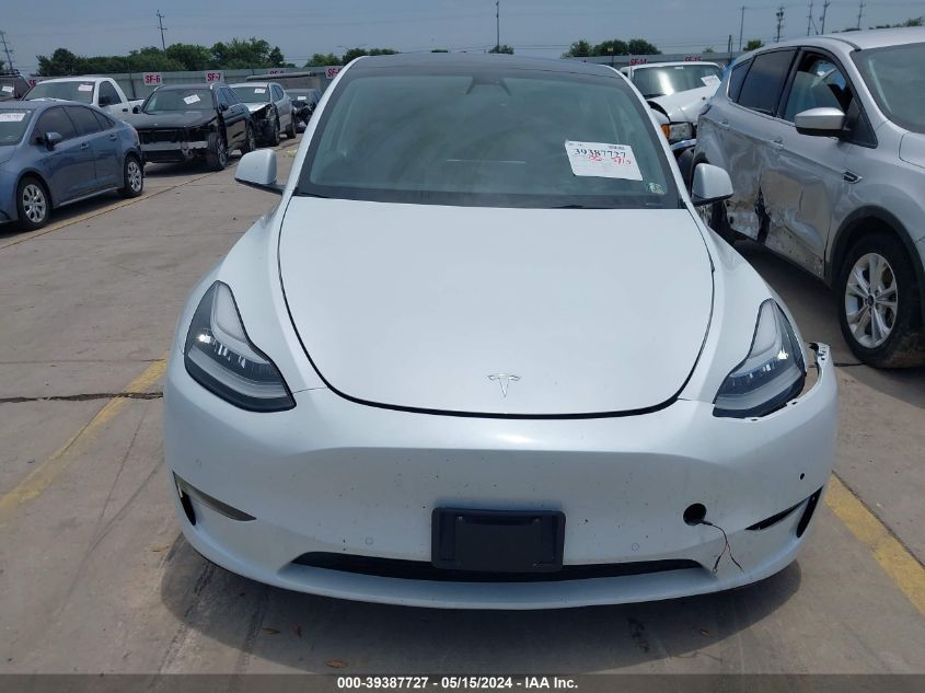 2022 Tesla Model Y Long Range Dual Motor All-Wheel Drive VIN: 7SAYGAEE8NF336595 Lot: 39387727