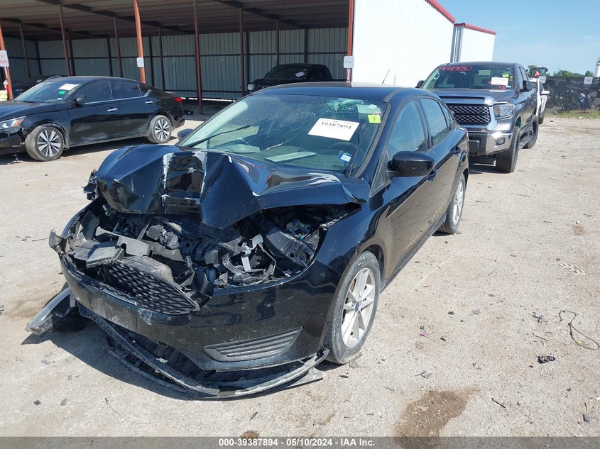 VIN 1FADP3F25JL321819 2018 FORD FOCUS SE