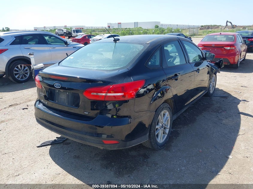 VIN 1FADP3F25JL321819 2018 FORD FOCUS SE