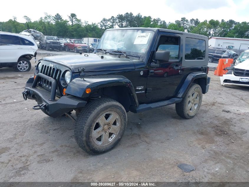 2010 Jeep Wrangler Sahara VIN: 1J4GA5D19AL112852 Lot: 39389627