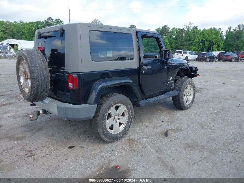 2010 Jeep Wrangler Sahara VIN: 1J4GA5D19AL112852 Lot: 39389627