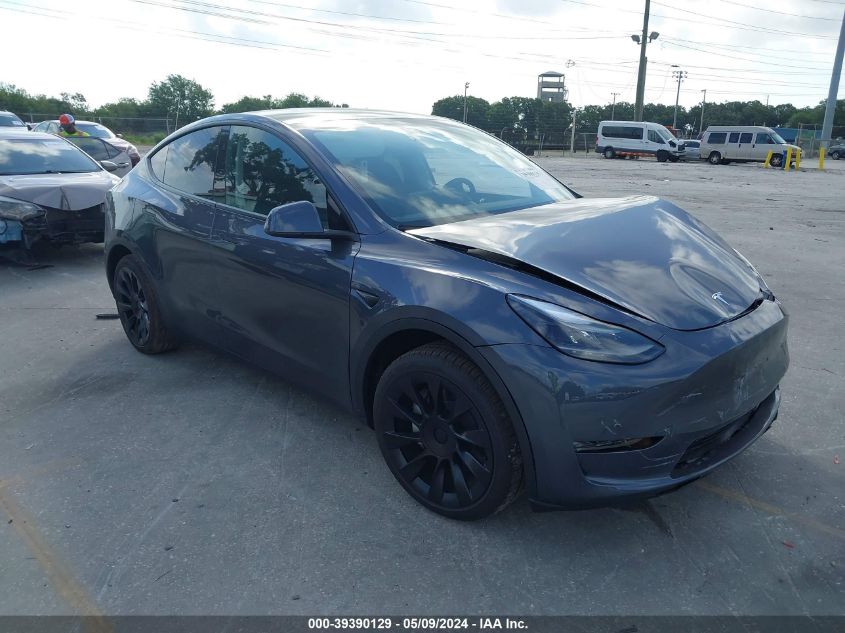 2023 Tesla Model Y Awd/Long Range Dual Motor All-Wheel Drive VIN: 7SAYGDEEXPA199922 Lot: 39390129