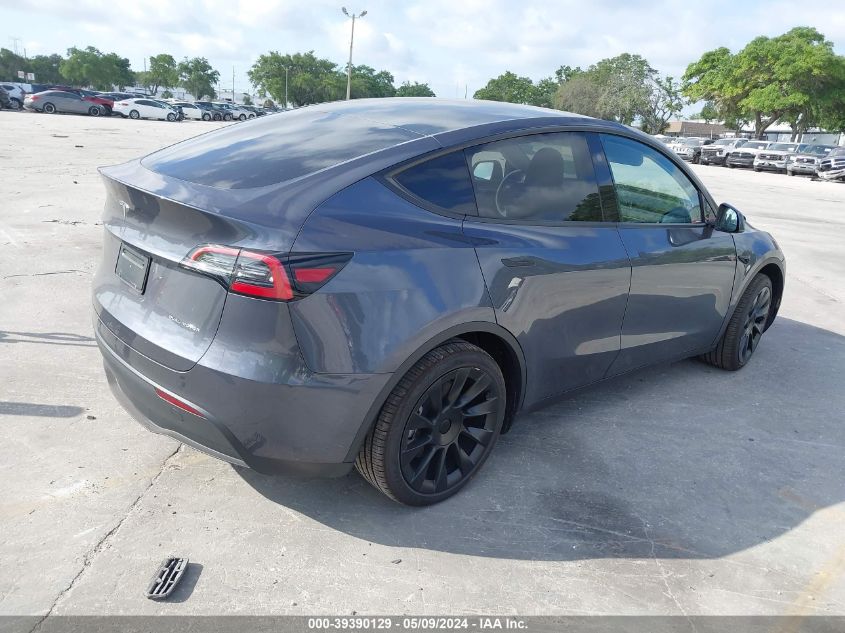 2023 Tesla Model Y Awd/Long Range Dual Motor All-Wheel Drive VIN: 7SAYGDEEXPA199922 Lot: 39390129