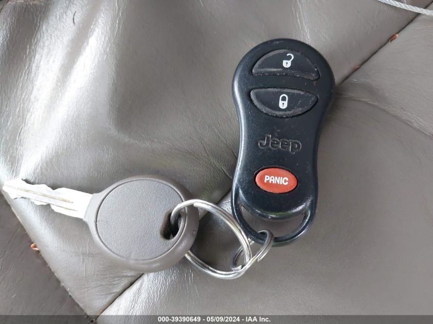 2003 Jeep Grand Cherokee Limited VIN: 1J8GW58N03C561398 Lot: 39390649