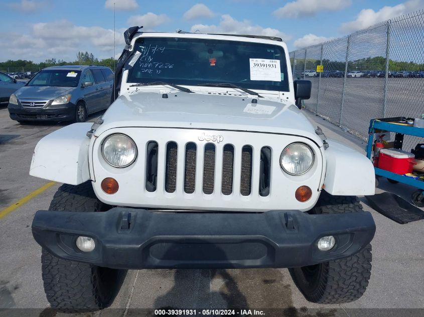 2011 Jeep Wrangler Unlimited Sahara VIN: 1J4HA5H16BL557226 Lot: 39391931