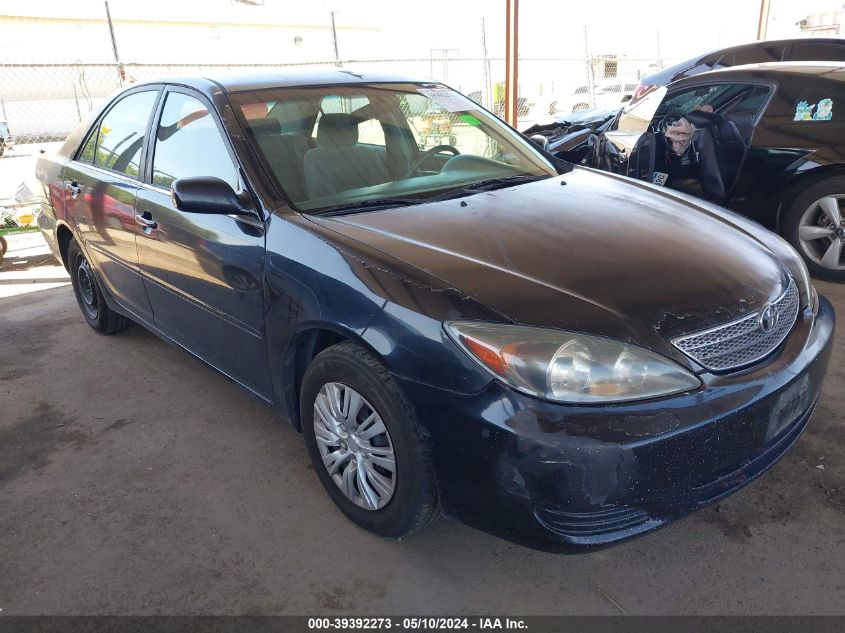 2002 Toyota Camry Le VIN: 4T1BE32K82U003844 Lot: 39392273