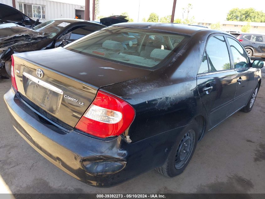 2002 Toyota Camry Le VIN: 4T1BE32K82U003844 Lot: 39392273