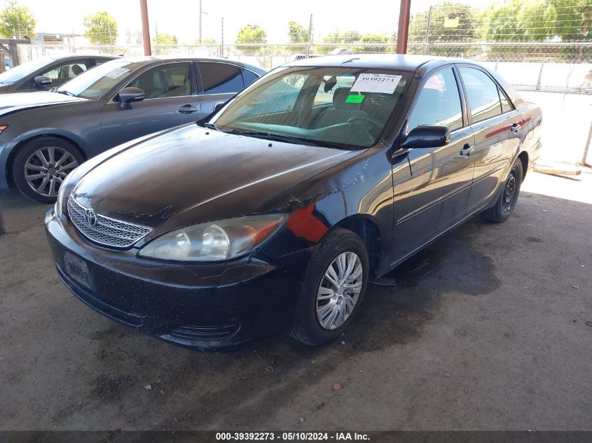 2002 Toyota Camry Le VIN: 4T1BE32K82U003844 Lot: 39392273