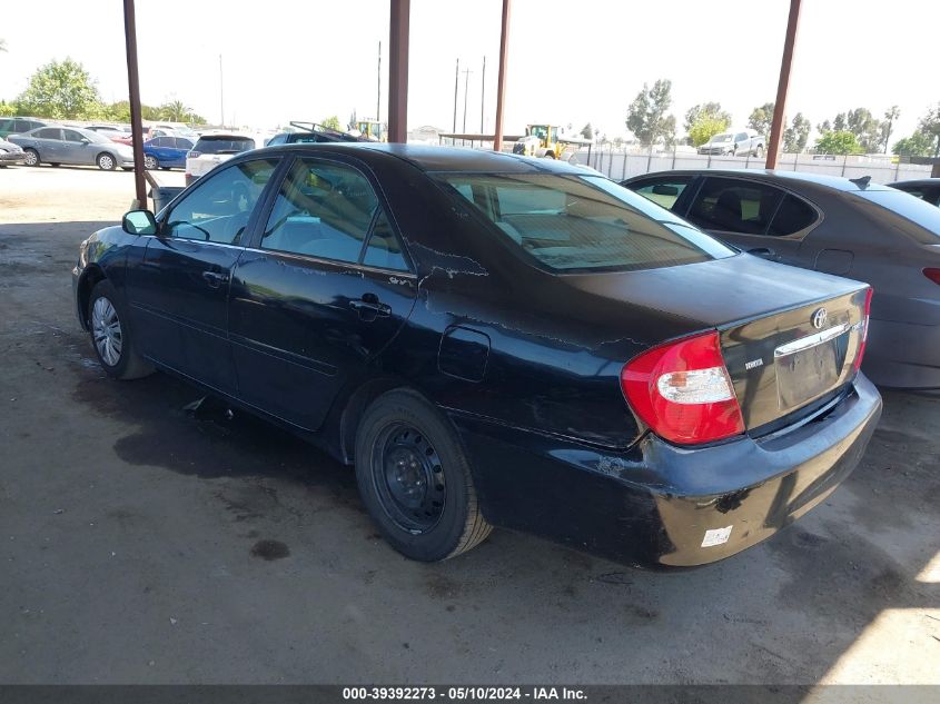 2002 Toyota Camry Le VIN: 4T1BE32K82U003844 Lot: 39392273