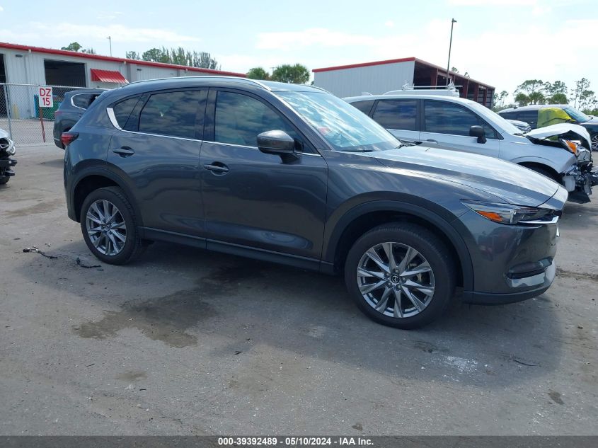 2021 Mazda Cx-5 Grand Touring VIN: JM3KFADMXM1354142 Lot: 39392489