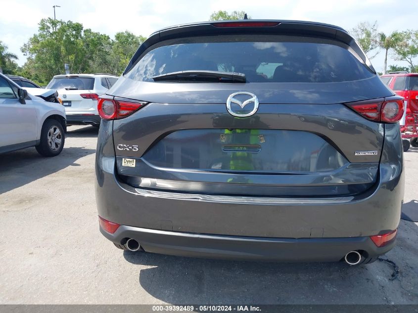 2021 Mazda Cx-5 Grand Touring VIN: JM3KFADMXM1354142 Lot: 39392489