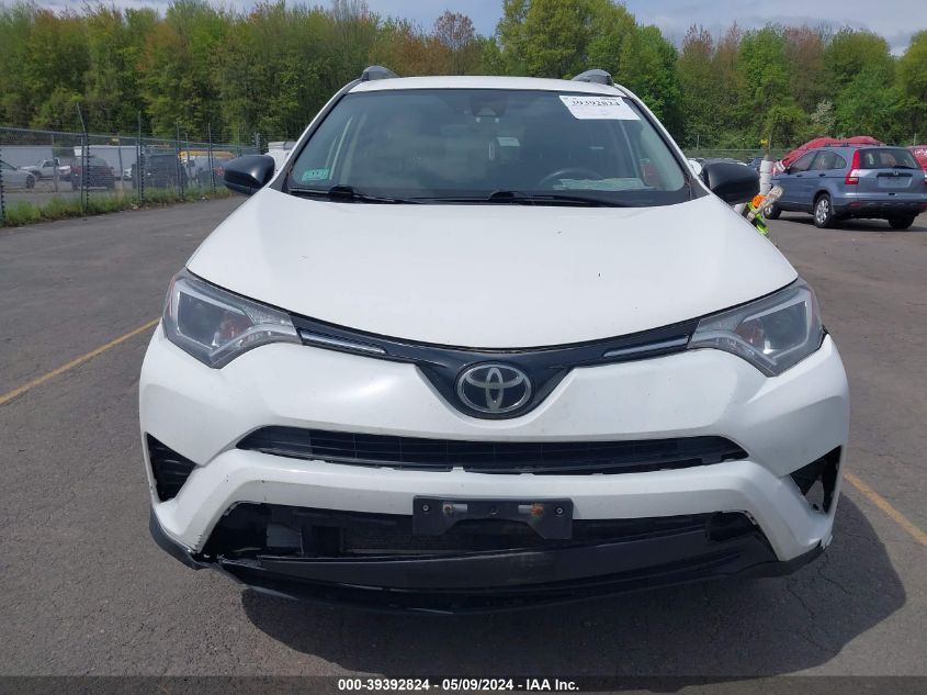 2018 Toyota Rav4 Le VIN: JTMBFREV7JD226093 Lot: 39392824