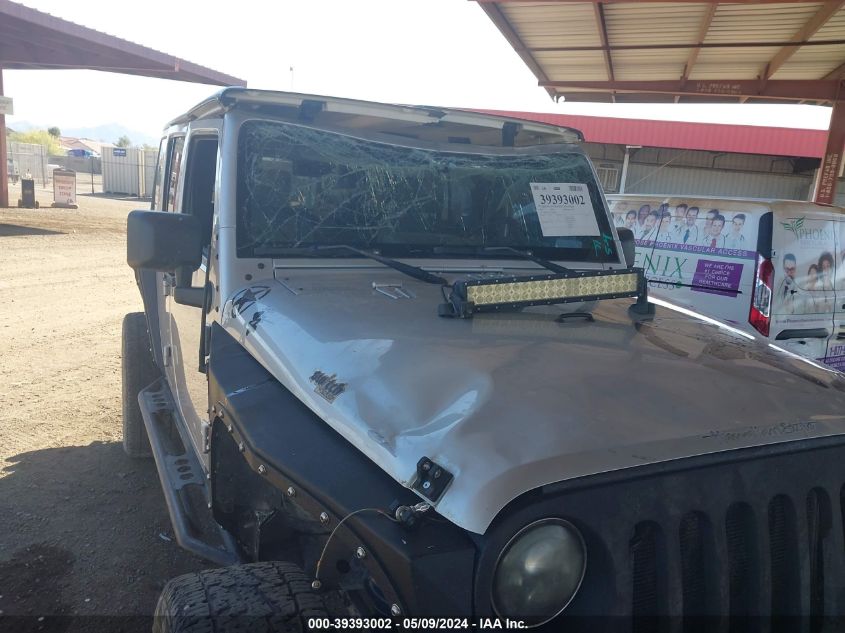 2007 Jeep Wrangler Unlimited Sahara VIN: 1J8GA59117L162404 Lot: 39393002