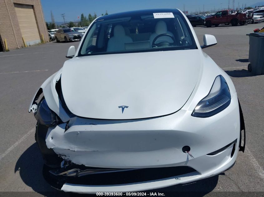 2023 Tesla Model Y VIN: 7SAYGDEE1PF741279 Lot: 39393600