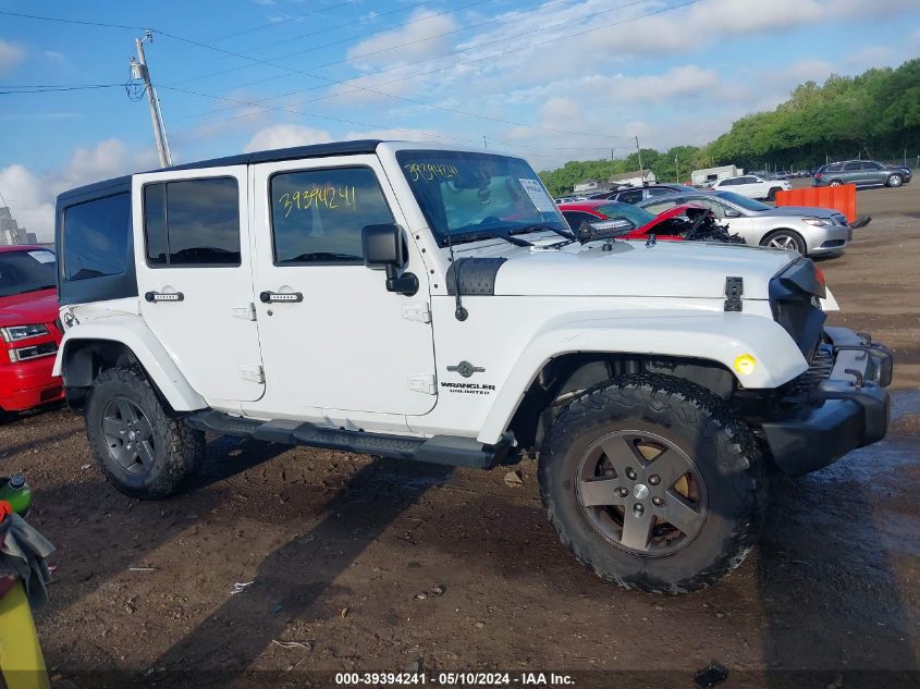 2013 Jeep Wrangler Unlimited Freedom Edition VIN: 1C4BJWDG5DL618063 Lot: 39394241