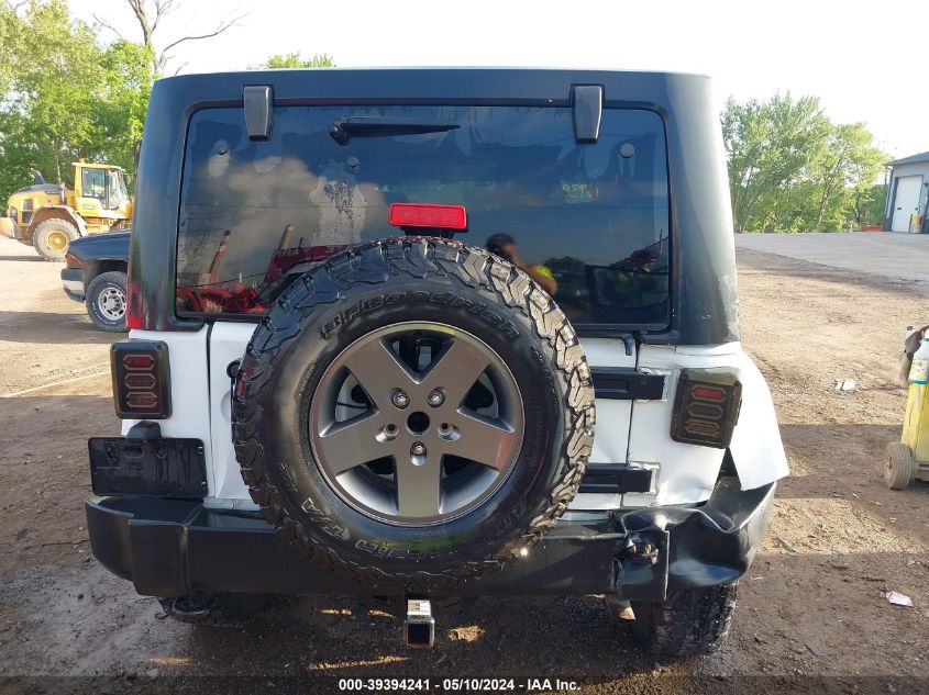 2013 Jeep Wrangler Unlimited Freedom Edition VIN: 1C4BJWDG5DL618063 Lot: 39394241