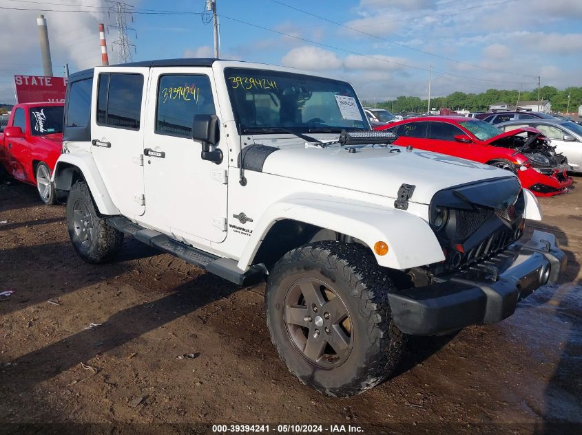 2013 Jeep Wrangler Unlimited Freedom Edition VIN: 1C4BJWDG5DL618063 Lot: 39394241