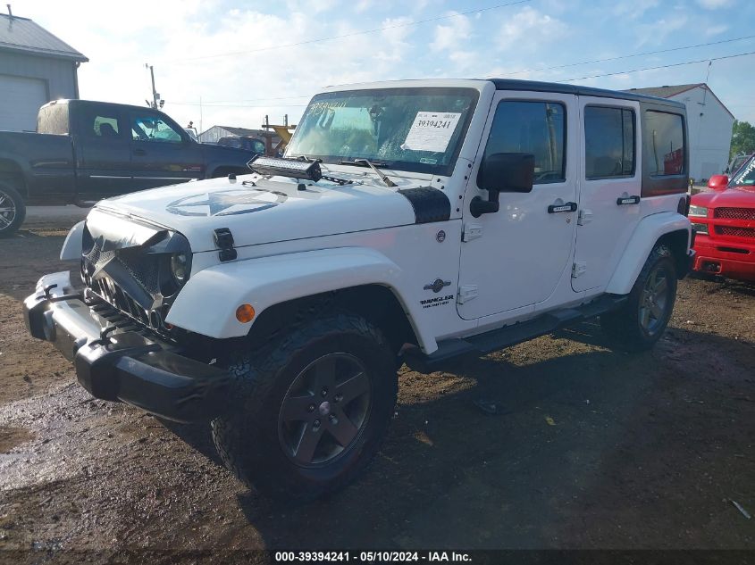 2013 Jeep Wrangler Unlimited Freedom Edition VIN: 1C4BJWDG5DL618063 Lot: 39394241