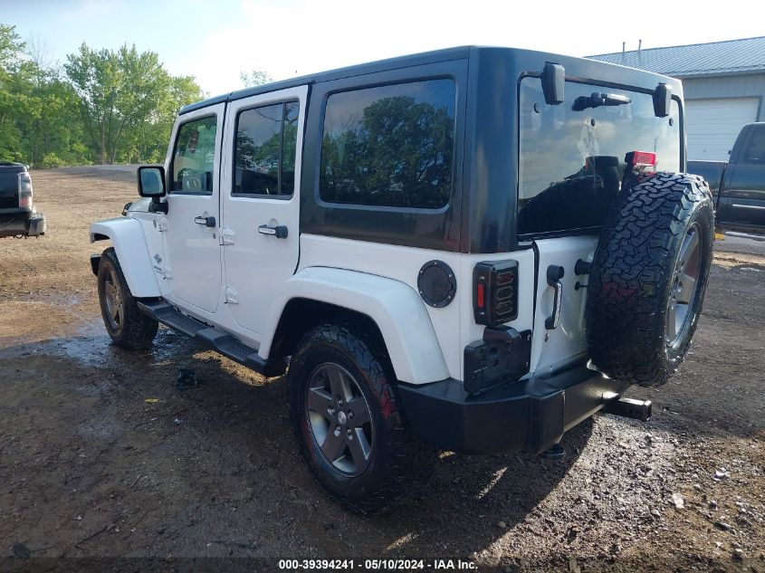 2013 Jeep Wrangler Unlimited Freedom Edition VIN: 1C4BJWDG5DL618063 Lot: 39394241