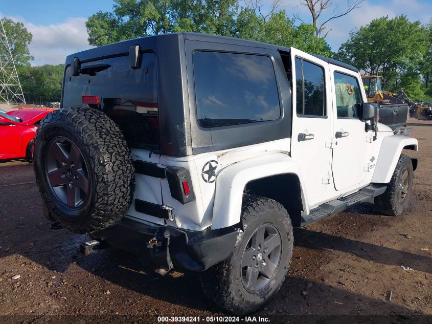 2013 Jeep Wrangler Unlimited Freedom Edition VIN: 1C4BJWDG5DL618063 Lot: 39394241