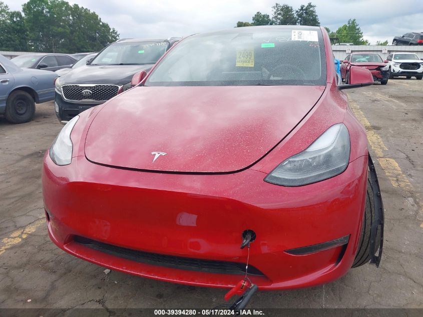 2023 Tesla Model Y Awd/Long Range Dual Motor All-Wheel Drive VIN: 7SAYGDEE4PF768699 Lot: 39394280