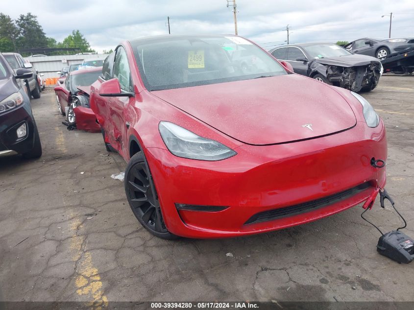 2023 Tesla Model Y Awd/Long Range Dual Motor All-Wheel Drive VIN: 7SAYGDEE4PF768699 Lot: 39394280