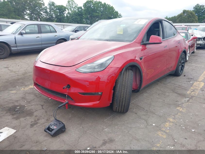 2023 Tesla Model Y Awd/Long Range Dual Motor All-Wheel Drive VIN: 7SAYGDEE4PF768699 Lot: 39394280