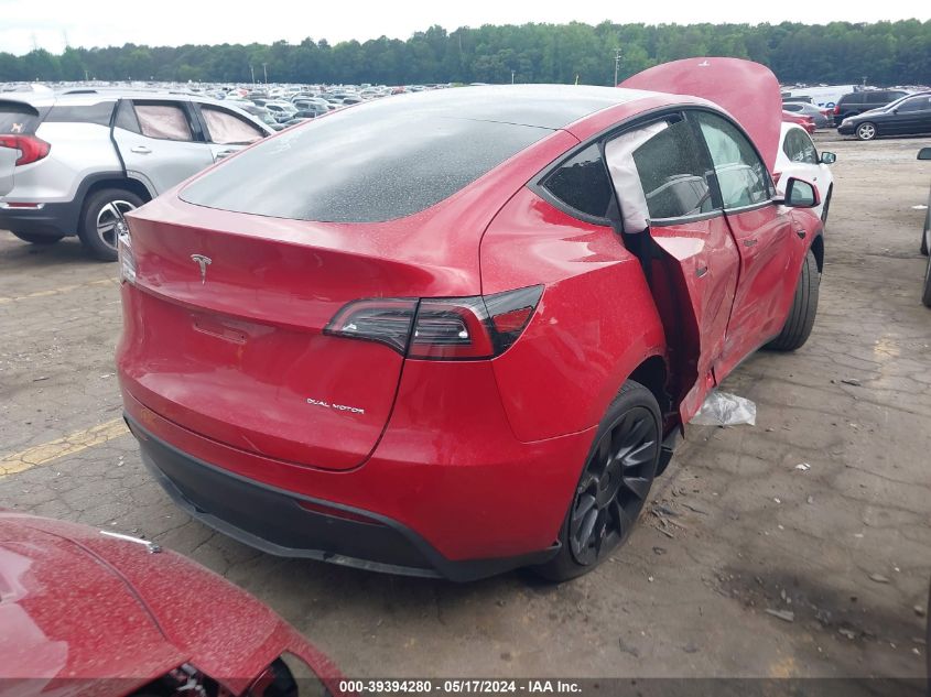 2023 Tesla Model Y Awd/Long Range Dual Motor All-Wheel Drive VIN: 7SAYGDEE4PF768699 Lot: 39394280