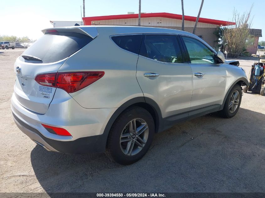 2018 Hyundai Santa Fe Sport 2.4L VIN: 5XYZTDLB6JG557428 Lot: 39394550