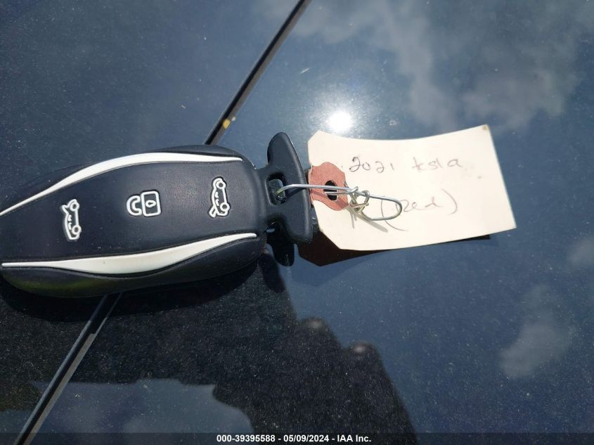 2021 Tesla Model 3 Standard Range Plus Rear-Wheel Drive VIN: 5YJ3E1EA3MF870192 Lot: 39395588