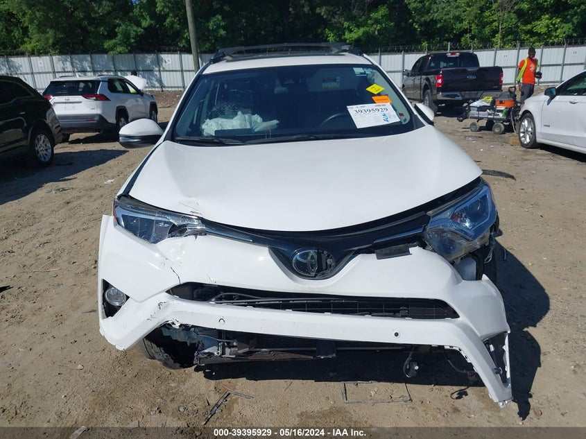 VIN JTMWFREV4JJ188633 2018 TOYOTA RAV4 XLE