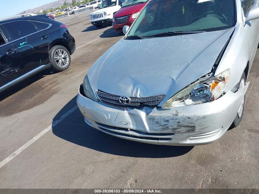 2004 Toyota Camry Le VIN: 4T1BE32K04U877284 Lot: 39396103