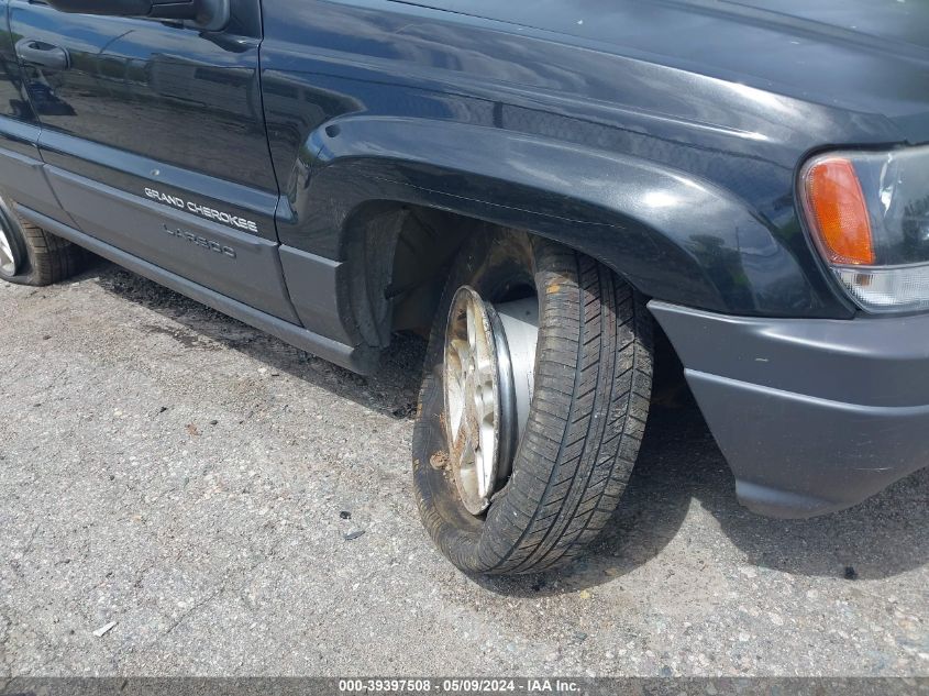 2003 Jeep Grand Cherokee Laredo VIN: 1J4GW48SX3C563113 Lot: 39397508