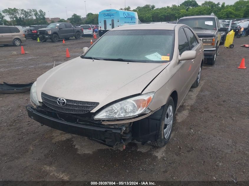 2002 Toyota Camry Le VIN: 4T1BE32K92U095983 Lot: 39397804