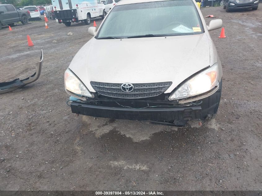 2002 Toyota Camry Le VIN: 4T1BE32K92U095983 Lot: 39397804