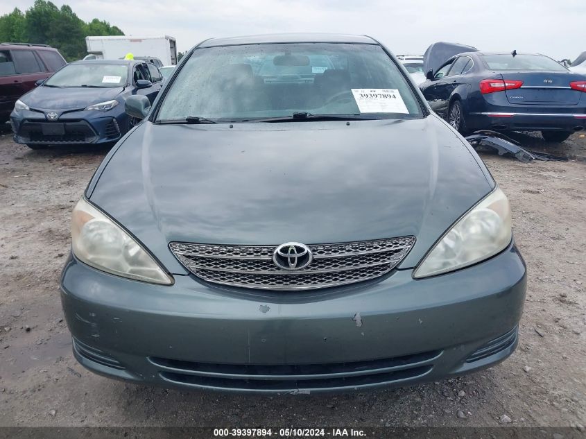 2002 Toyota Camry Le VIN: 4T1BE32K02U602138 Lot: 39397894