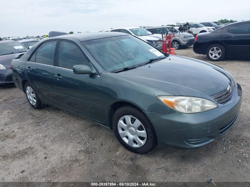 2002 Toyota Camry Le VIN: 4T1BE32K02U602138 Lot: 39397894