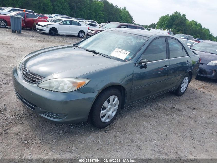 2002 Toyota Camry Le VIN: 4T1BE32K02U602138 Lot: 39397894