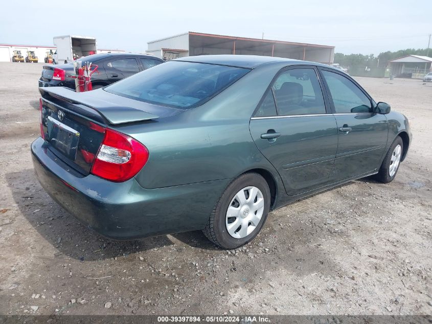 2002 Toyota Camry Le VIN: 4T1BE32K02U602138 Lot: 39397894