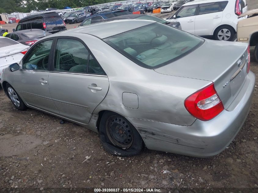 2004 Toyota Camry Le VIN: JTDBE32K740254689 Lot: 39398837
