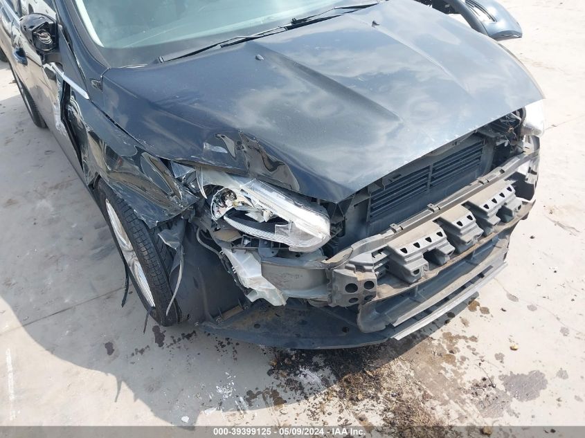 2015 Ford Focus Titanium VIN: 1FADP3N21FL386871 Lot: 39399125